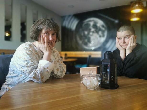 Two women sitting at a table